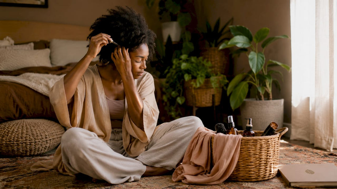 Woman preparing natural hair for wrapping
