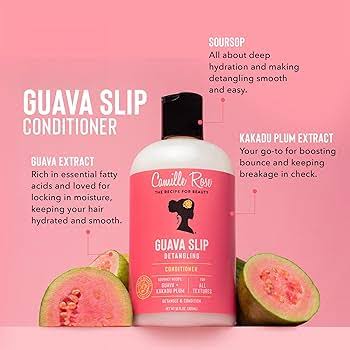 A bottle of Comillo Rose Guava Slip Conditioner centered on a pink background, with sliced guava fruit pieces at the base and marketing text around it.